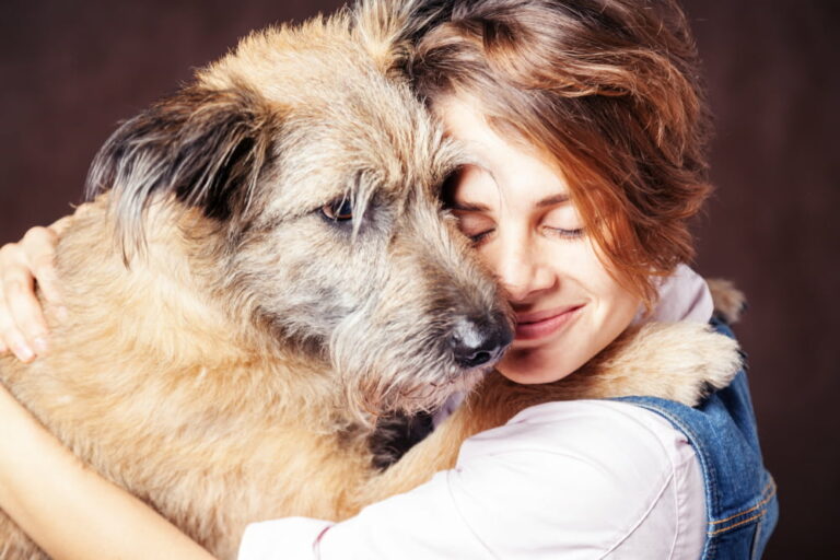 Woman hugging a rescue dog
