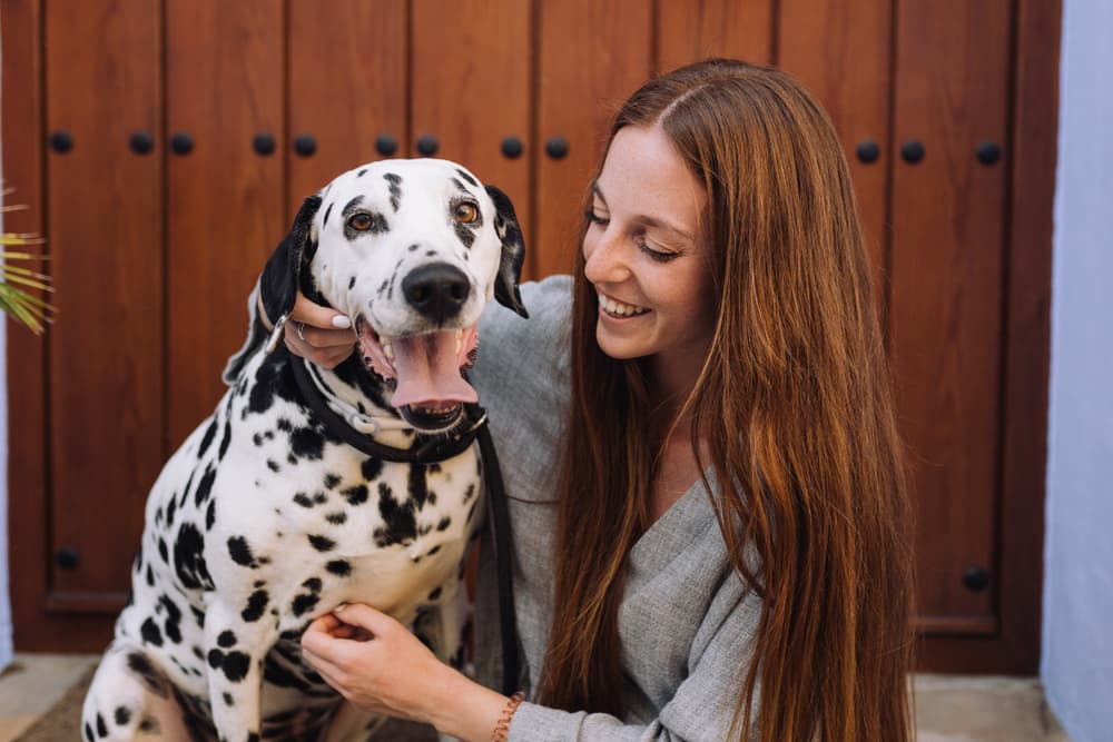 Woman with Dalmatian dog