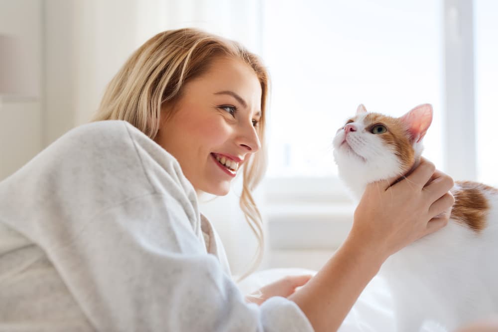 Woman petting her cat